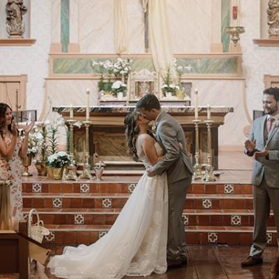 Sadie and Jack kiss at the altar after exchanging vows