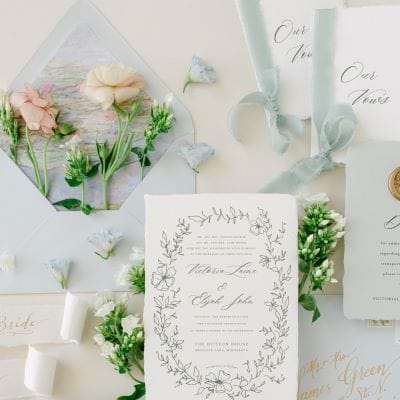 Spring garden design with lush florals and intricate detailing boasts gold, blush pink, blue and green color palette