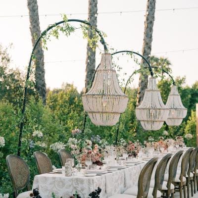 Luxe tablescape with deep moody florals and elegant details at Villa Zosaneli