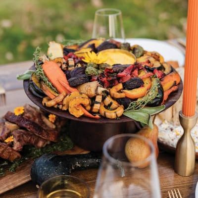 Fall inspired outdoor tablescape with a seasonal Chowgirls menu