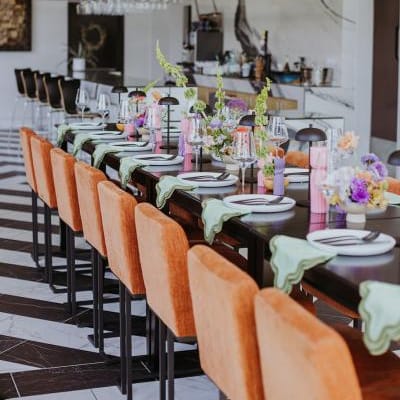 Modern and funky imagined reception scene featuring pastel hues at District Wine Bar