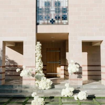 Cloudlike blooms form a modern altar on the lawn of new venue The Bird Estate
