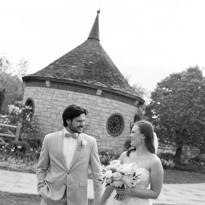 Madelyn and Andrew glance at each other and walk on their wedding day