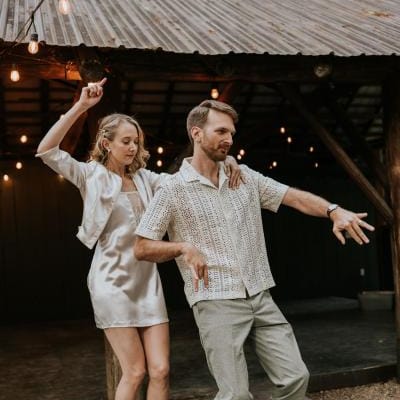 Marjean and Dan start the dancing in their reception attire at Loloma Lodge