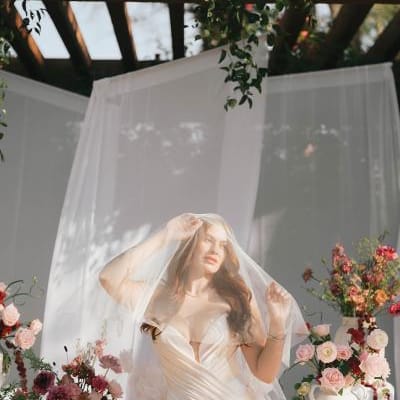 Model poses in the mauve-hued altar space at Hermosa Inn
