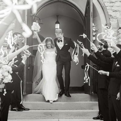 Christina and Dalton exit their ceremony at Lake of the Isles Lutheran Church