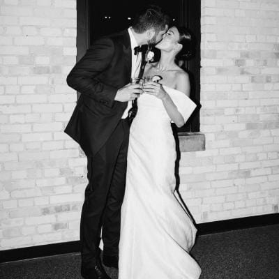 Kara and Jordan share a kiss on their wedding day 