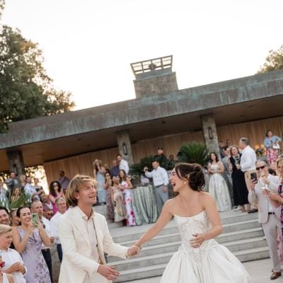 Sarina and Travis grace the custom dance floor of their Rococo-inspired wedding