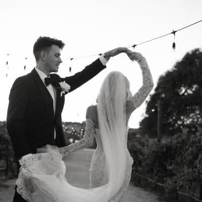 Dillon twirls Brittany on the grounds of Cass Winery