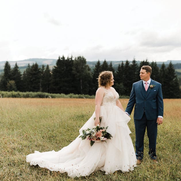 The bride's wild bouquet from Lucy's Informal Flowers fits the Mt. View Orchard scenery