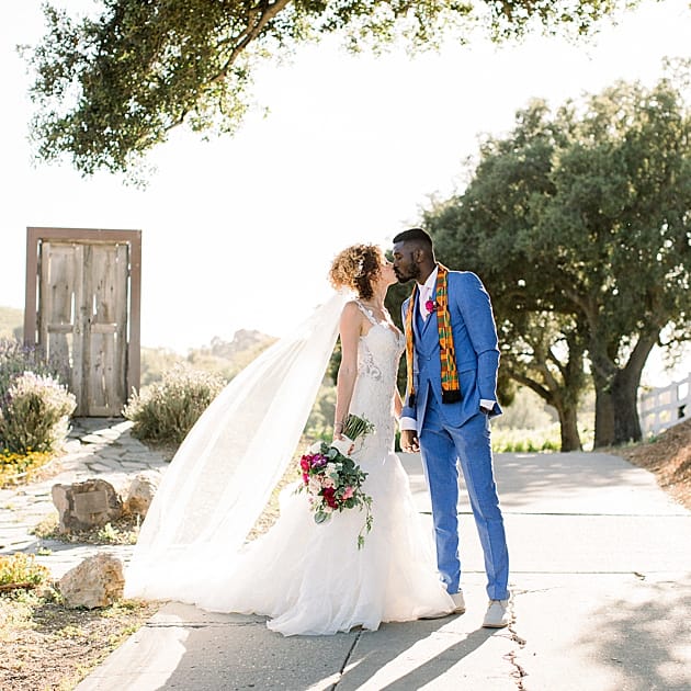 Bride and groom kissing