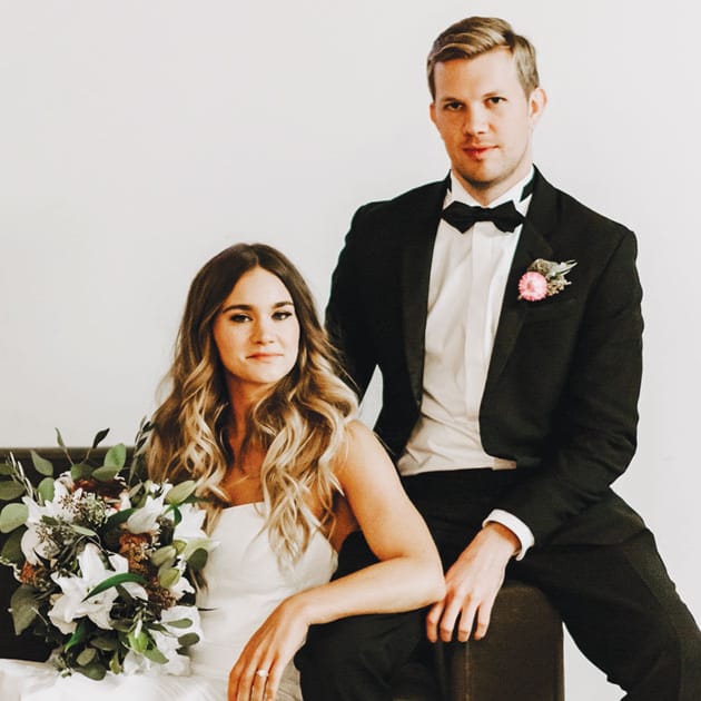 The couple lounging at PAIKKA, captured by Gilded Sparrow Photography