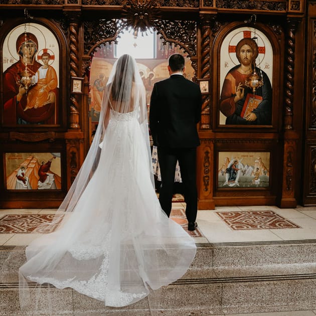 Demi and Aleks before their ceremony at New Gracanica Serbian Monastery in Third Lake, Illinois.