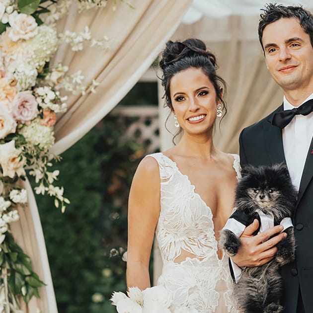 Sarah, Josh and their cat at their wedding at Admiral's House