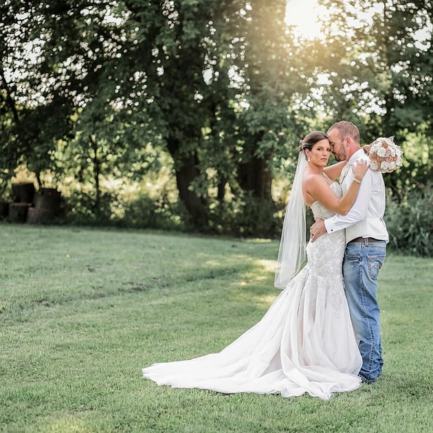 Married couple with groom in jeans