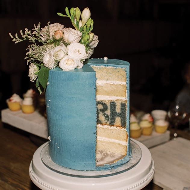 The bride and groom's initials are revealed when this wedding cake is cut open.