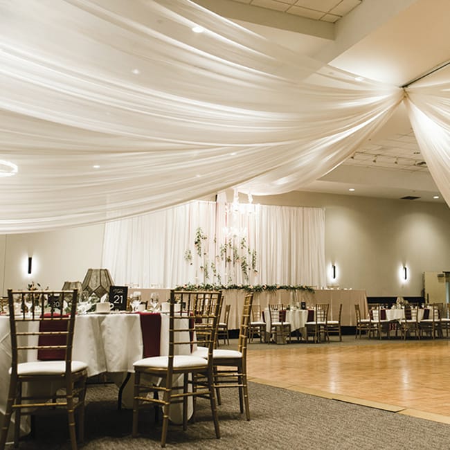 The dance floor and decorated tables at Inwood Oaks, a new wedding venue in Oakdale owned by Mintahoe Catering & Events
