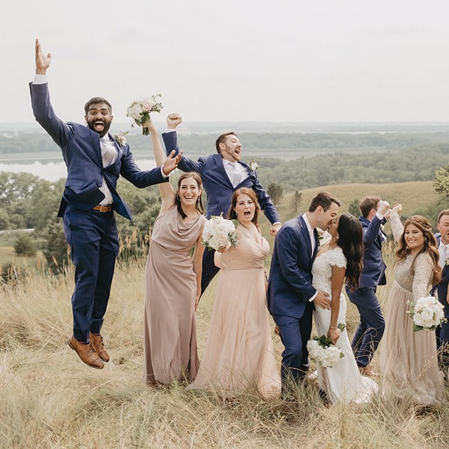 Ruwani and Zach pose with their wedding party at The Hutton House.