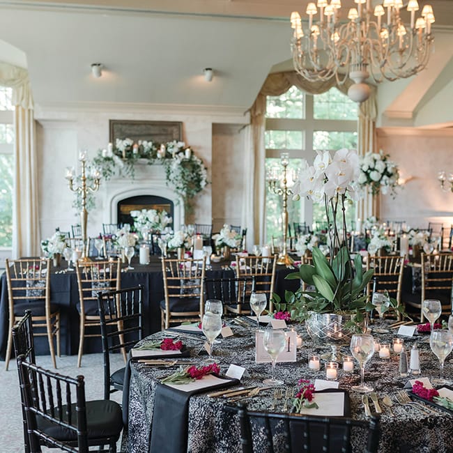 The dining room at the Oneida Golf and Country Club set up for a wedding.