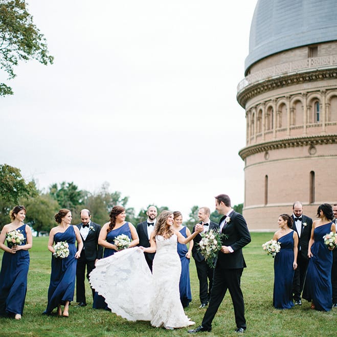 The wedding party poses for photos at the Yerkes Observatory.
