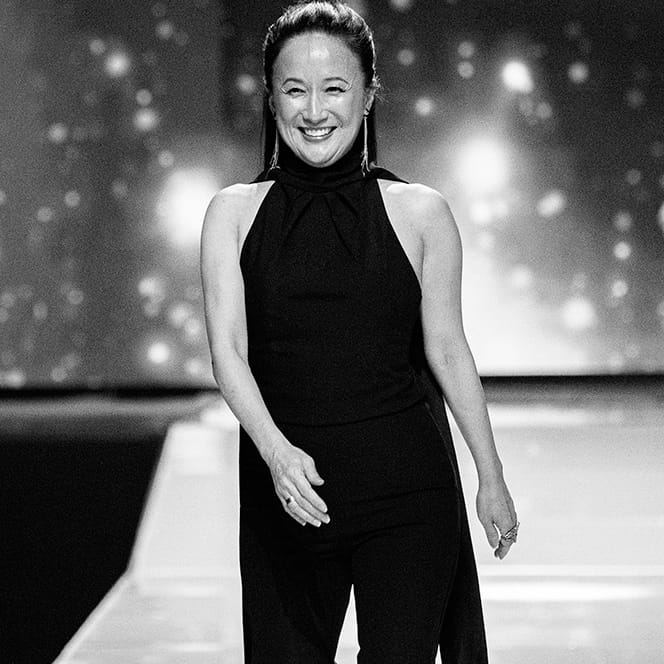 Luly Yang walks the runway in fashion show