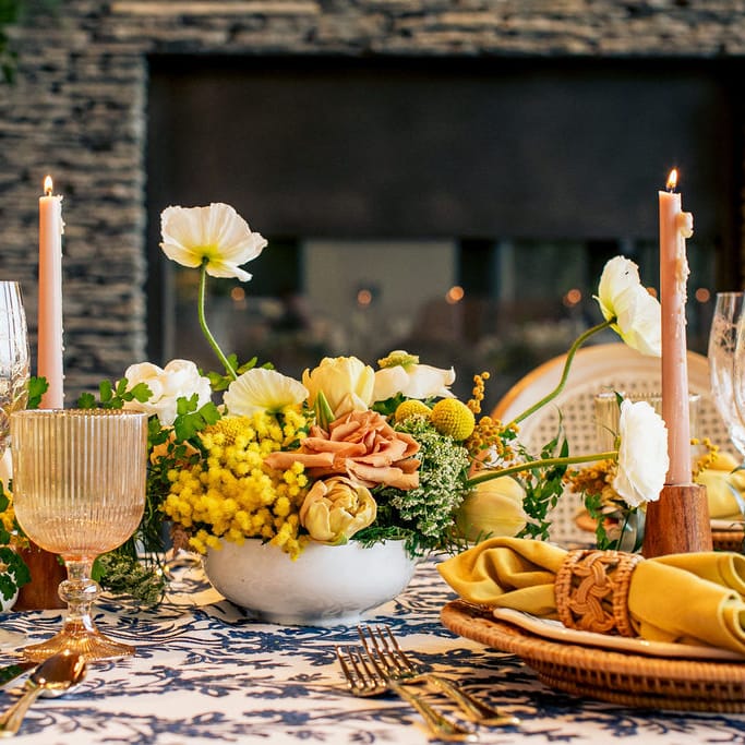 Cheery brunch tablescape inspiration featuring yellow and mauve florals