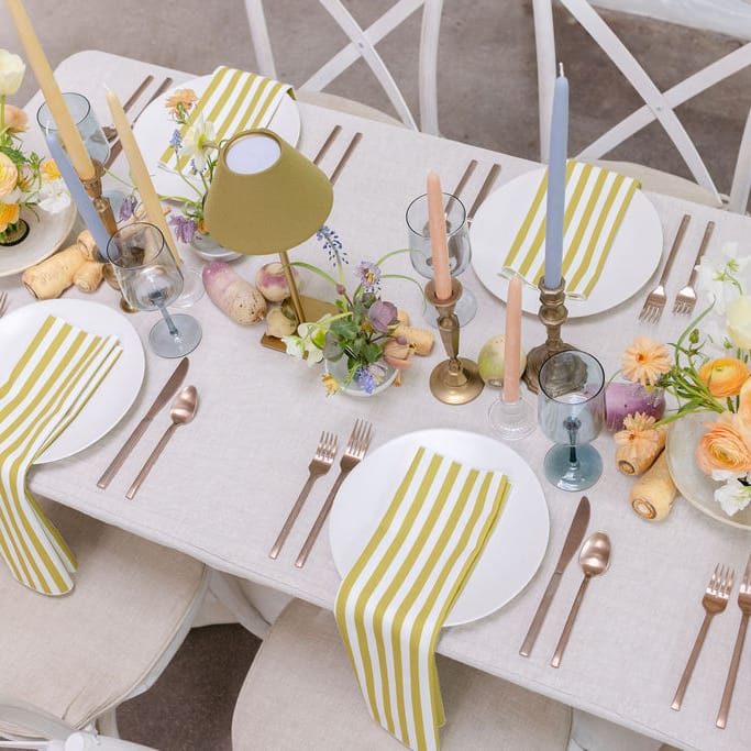 Light and airy tablescape featuring a palette of soft pastels, local blooms and vegetable details at The Whim