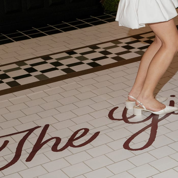 A shot of the custom "girl's room" dance floor at Lindsay and Natalie's winning wedding day