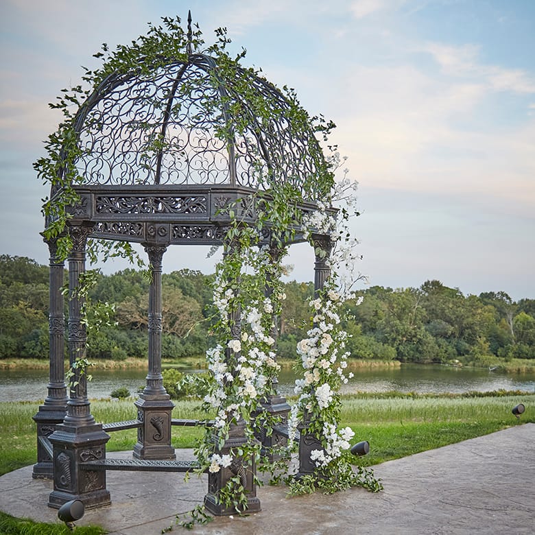 Wedding arch with pastel florals at Bavaria Downs