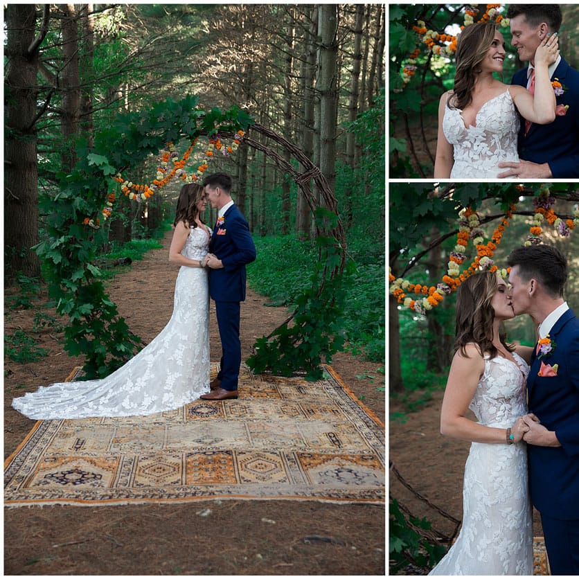 A couple stands before their ceremony backdrop; photographed by Wild Elegance