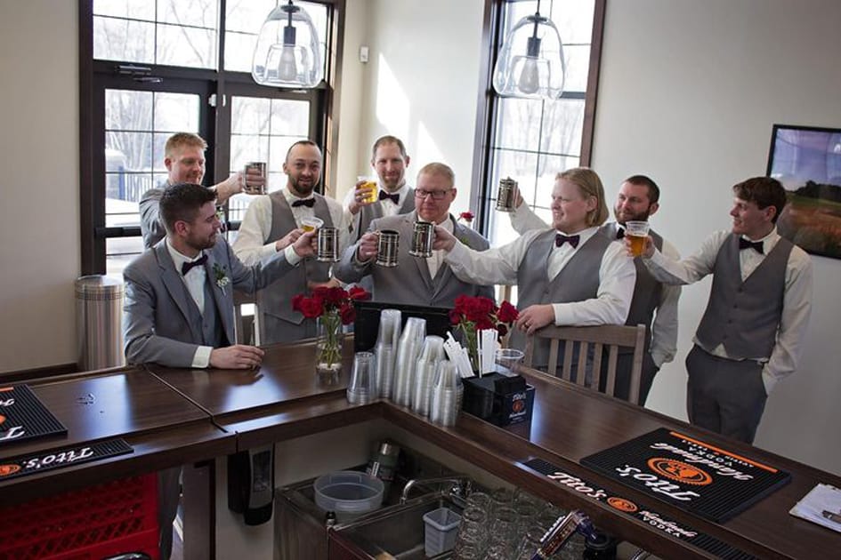 groomsmen cheersing